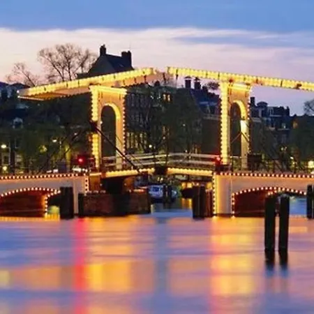 Tiny Houseboat On The Amstel River *