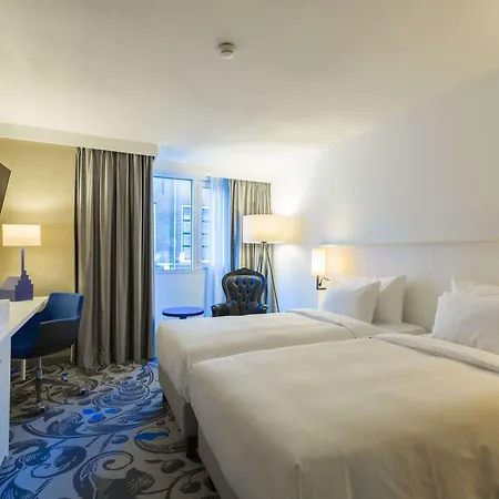 Hotel Radisson Blu Hotel, City Center 4*