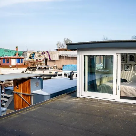 Houseboat-amsterdam Couette-café Amsterdam