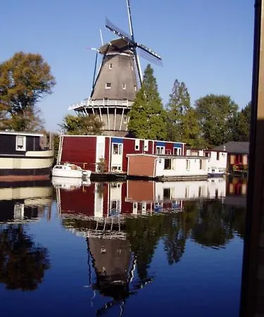 Houseboat Under The Mill Amsterdam
